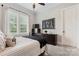 Comfortable bedroom featuring a ceiling fan and natural light at 9125 Dylan Ridge Ct, Concord, NC 28027