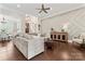 Spacious living room featuring a decorative accent wall and hardwood floors at 9125 Dylan Ridge Ct, Concord, NC 28027