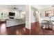 Open-concept view of the living room with a fireplace and hardwood floors at 9125 Dylan Ridge Ct, Concord, NC 28027