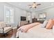 Spacious bedroom featuring a ceiling fan, natural light, and neutral paint at 9125 Dylan Ridge Ct, Concord, NC 28027