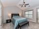 Cozy bedroom with a vaulted ceiling, fan and comfortable queen bed at 9530 Elizabeth Townes Ln, Charlotte, NC 28277
