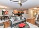 Spacious living room with wood-look flooring, seamlessly connected to the dining area and kitchen at 9530 Elizabeth Townes Ln, Charlotte, NC 28277