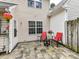 Inviting outdoor patio area with hardscaping, outdoor furniture, and home exterior views at 9530 Elizabeth Townes Ln, Charlotte, NC 28277