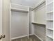 Spacious walk-in closet with built-in shelves and rods for maximum storage at 9530 Elizabeth Townes Ln, Charlotte, NC 28277