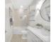 Clean and bright bathroom with a tub shower, decorative tile floor, and glass shelving at 1006 Phar Lap Dr, Indian Trail, NC 28079