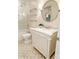 Bathroom with tub-shower features a marble vanity, patterned tile floor, and sleek fixtures at 1006 Phar Lap Dr, Indian Trail, NC 28079