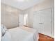 Cozy bedroom with neutral walls, wood floors, and double closets at 1006 Phar Lap Dr, Indian Trail, NC 28079