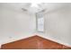 Bright bedroom featuring beautiful hardwood floors and a window that provides natural light at 1006 Phar Lap Dr, Indian Trail, NC 28079