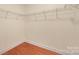 Walk-in closet provides efficient storage solutions with wire shelving system at 1006 Phar Lap Dr, Indian Trail, NC 28079