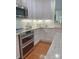 Well-appointed kitchen with stainless steel oven, white cabinetry, and ample counter space at 1006 Phar Lap Dr, Indian Trail, NC 28079