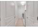 Functional laundry room featuring tile flooring, modern washer and dryer, and ample lighting at 1006 Phar Lap Dr, Indian Trail, NC 28079