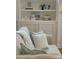 A cozy living room with built-in shelving, a comfortable sofa, and stylish decor at 1006 Phar Lap Dr, Indian Trail, NC 28079