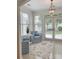 Bright sunroom with two armchairs and lots of natural light at 1006 Phar Lap Dr, Indian Trail, NC 28079