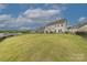 Expansive backyard with lush lawn and panoramic views at 1048 Harbor Bay Dr, Indian Land, SC 29707