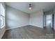 Bedroom features wood-look flooring and plenty of natural light at 1048 Harbor Bay Dr, Indian Land, SC 29707