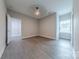 Bedroom features wood-look flooring, neutral paint and closet space at 1048 Harbor Bay Dr, Indian Land, SC 29707