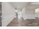 Elegant foyer with hardwood floors, wainscoting, and staircase leading to the upper level at 1048 Harbor Bay Dr, Indian Land, SC 29707