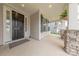 View of a home's front porch, showing stone pillars and a welcoming entryway at 1048 Harbor Bay Dr, Indian Land, SC 29707