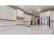 Spacious kitchen with large center island, gold faucet, and built in stainless steel appliances at 1048 Harbor Bay Dr, Indian Land, SC 29707
