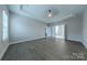 Bright bedroom with hardwood floors, recessed lights and en-suite bathroom at 1048 Harbor Bay Dr, Indian Land, SC 29707