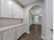 Walk-in pantry features built-in cabinetry and countertops, and opens to a dining area at 1048 Harbor Bay Dr, Indian Land, SC 29707