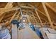Unfinished attic with exposed beams and ample storage space at 10501 Mount Olive Dr # 7, Mount Pleasant, NC 28124