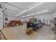 This garage contains an orange tractor, work benches, spare tires, and plenty of storage space at 10501 Mount Olive Dr # 7, Mount Pleasant, NC 28124