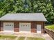 Red brick garage with two bays and a single entry door at 10501 Mount Olive Dr # 7, Mount Pleasant, NC 28124