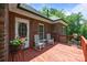 Inviting front porch with rocking chairs, brick exterior and a decorative front door at 10501 Mount Olive Dr # 7, Mount Pleasant, NC 28124
