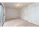 Neutral carpeted bedroom offers great natural light and features a double-door closet at 10548 English Setter Way, Charlotte, NC 28269