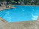 Outdoor community pool with lounge chairs and landscaping at 10548 English Setter Way, Charlotte, NC 28269