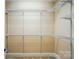 Walk-in closet with extensive metal shelving, ample storage, and beige carpet at 10607 Newberry Park Ln, Charlotte, NC 28277