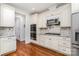Modern kitchen equipped with stainless steel appliances, gas cooktop, and ample counter space at 10874 Rise Ln, Fort Mill, SC 29707