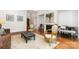 Beautiful living room featuring a fireplace, hardwood floors, and elegant decor at 10874 Rise Ln, Fort Mill, SC 29707