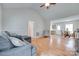 Open-concept living space with vaulted ceilings, a casual dining area, and wood-look floors at 110 Eighth St, York, SC 29745