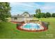Home aerial with a fenced pool and manicured backyard, perfect for outdoor living and entertaining at 112 Ocean Dr, Shelby, NC 28152