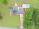 Overhead view of the house, pool, deck and driveway surrounded by well-manicured lawn and mature trees at 112 Ocean Dr, Shelby, NC 28152