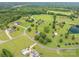 Community aerial view showing lush greenery, mature trees, manicured properties and scenic landscape at 112 Ocean Dr, Shelby, NC 28152