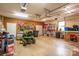 This garage features pegboard walls, shelving, and garage door openers at 112 Ocean Dr, Shelby, NC 28152
