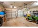 This garage features multiple garage door openers, shelving, and pegboard at 112 Ocean Dr, Shelby, NC 28152