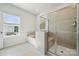 Bright bathroom with a large shower, soaking tub, and a modern vanity at 1229 Margo Mannor Dr, Fort Mill, SC 29708