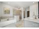 Bright bathroom featuring a soaking tub, walk-in shower, and white countertops at 1229 Margo Mannor Dr, Fort Mill, SC 29708
