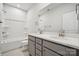 Elegant bathroom with double sinks, quartz counters, and a tub with shower at 1229 Margo Mannor Dr, Fort Mill, SC 29708