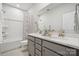 Bathroom featuring double sinks, granite countertops, and a combined shower and tub at 1229 Margo Mannor Dr, Fort Mill, SC 29708