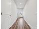 Bright hallway features wood-look floors and a white front door, creating a welcoming entrance at 1229 Margo Mannor Dr, Fort Mill, SC 29708