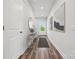 Inviting hallway with hardwood floors, stylish console table and a bright, welcoming entrance at 1229 Margo Mannor Dr, Fort Mill, SC 29708