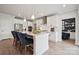 Bright kitchen featuring an island with barstool seating and modern pendant lighting at 1229 Margo Mannor Dr, Fort Mill, SC 29708