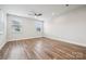 Spacious bedroom with hardwood floors, neutral colors, and ample natural light at 1229 Margo Mannor Dr, Fort Mill, SC 29708