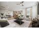 Open concept living space with modern furniture, stylish decor, and seamless transition to kitchen and dining areas at 1229 Margo Mannor Dr, Fort Mill, SC 29708