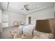 Cozy main bedroom featuring a comfortable bed, recessed lighting, and a large window with natural light at 1229 Margo Mannor Dr, Fort Mill, SC 29708